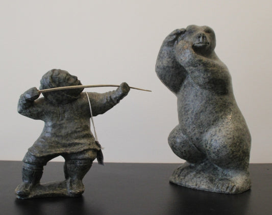 Inuit Man Fighting With Bear