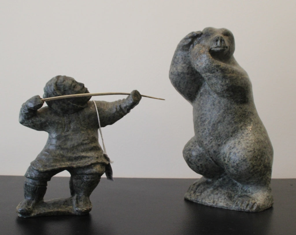 Inuit Man Fighting With Bear